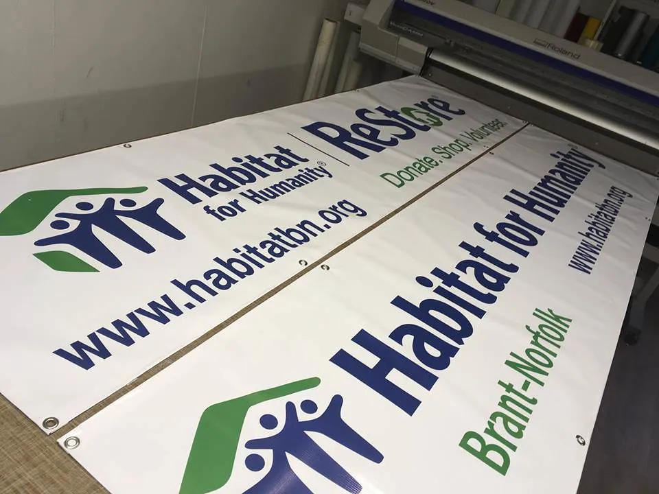 Custom printed vinyl banner on display