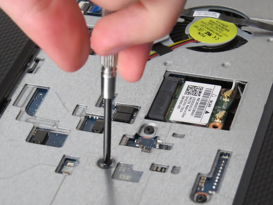 Technician repairing a computer