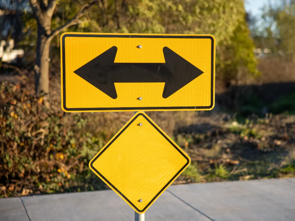 Directional road sign pointing the way