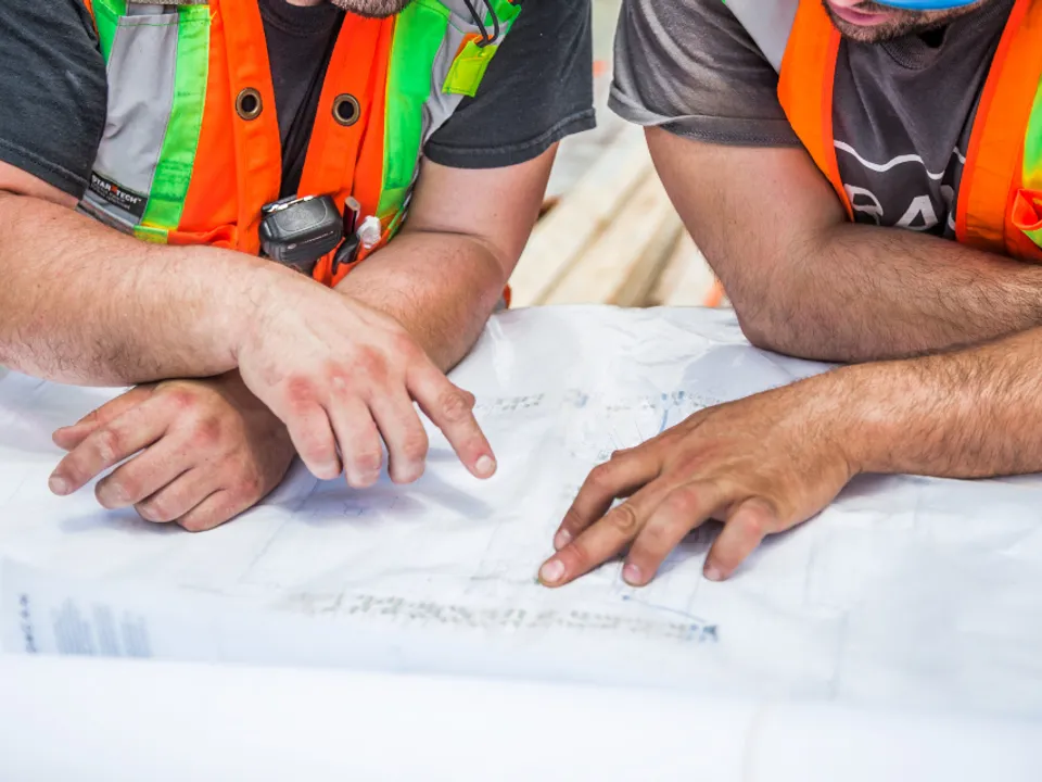 Building plans and blueprints spread out