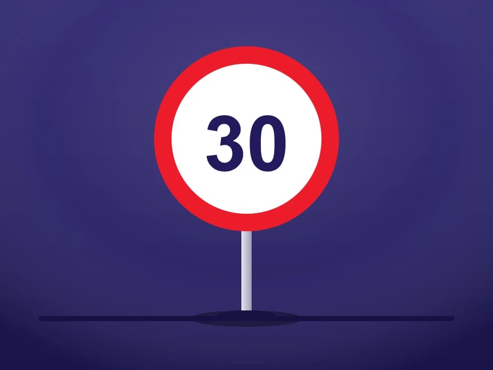 Thirty speed limit sign on a post
